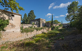 Western part of the "Manufacture des draps de Villeneuvette", Hérault, France. View from Northwest in 2013.