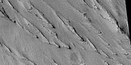 Yardangs, as seen by HiRISE under HiWish program Location is near Gordii Dorsum in the Amazonis quadrangle. Note: this is an enlargement of previous image.