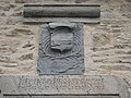 Inscription au dessus de la porte de l'église DIEU SOIT LOUE A TOUT JAMAIS CAR IL A ENTANDEU ET EXAUCE MA VOIS FAICT A SA LOUANGE ...1605 Armes du capitaine Calvet ?