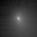 One of the two pictures of Tempel 1 (see also PIA02100) taken by Deep Impact's medium-resolution camera is shown next to data of the comet taken by the spacecraft's infrared spectrometer. This instrument breaks apart light like a prism to reveal the "fingerprints," or signatures, of chemicals. Even though the spacecraft was over 10 days away from the comet when these data were acquired, it detected some of the molecules making up the comet's gas and dust envelope, or coma. The signatures of these molecules -- including water, hydrocarbons, carbon dioxide and carbon monoxide -- can be seen in the graph, or spectrum. Deep Impact's impactor spacecraft is scheduled to collide with Tempel 1 at 10:52 p.m. Pacific time on July 3 (1:52 a.m. Eastern time, July 4). The mission's flyby spacecraft will use its infrared spectrometer to sample the ejected material, providing the first look at the chemical composition of a comet's nucleus. These data were acquired from June 20 to 21, 2005. The picture of Tempel 1 was taken by the flyby spacecraft's medium-resolution instrument camera. The infrared spectrometer uses the same telescope as the high-resolution instrument camera.