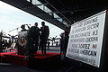 Former US President Ronald Reagan is presented a now obsolete checkpoint sign at Tempelhof Airport in Sep 1990.