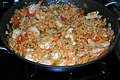 Creole Jambalaya with shrimp, ham, tomato, and Andouille sausage