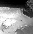 The image was taken by a camera aboard the Sojourner rover on Sol 4. The large rock Yogi can be seen at the upper right portion of the image. Sojourner's Alpha Proton X-Ray Spectrometer instrument is currently studying the sand around Yogi, and may study Yogi itself later on. One of Sojourner's cleated wheels is visible at lower right. Mars Pathfinder is the second in NASA's Discovery program of low-cost spacecraft with highly focused science goals. The Jet Propulsion Laboratory, Pasadena, CA, developed and manages the Mars Pathfinder mission for NASA's Office of Space Science, Washington, D.C. JPL is an operating division of the California Institute of Technology (Caltech). The Imager for Mars Pathfinder (IMP) was developed by the University of Arizona Lunar and Planetary Laboratory under contract to JPL. Peter Smith is the Principal Investigator.