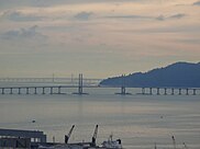 The two Penang bridges straddling the sea.