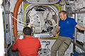 Jose Hernandez and Tim Kopra in the Quest airlock as astronauts John "Danny" Olivas,and Nicole Stott prepare to exit the airlock.