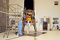 Spitzer in a hangar at Kennedy Space Center being prepared to be placed atop its rocket.