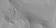 Close view of layers along edge of pedestal crater from previous image, as seen by HiRISE under HiWish program