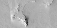 Close view of layers along edge of pedestal crater from previous image, as seen by HiRISE under HiWish program. Some dark slope streaks are visible.