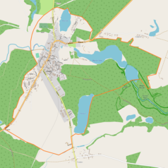 Mapa konturowa Człopy, blisko centrum na prawo u góry znajduje się owalna plamka nieco zaostrzona i wystająca na lewo w swoim dolnym rogu z opisem „Jezioro Młyńskie Wielkie”