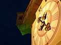 Closeup of the Clock at night, notice the short handle indicating the minutes