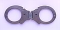 Hinged handcuffs