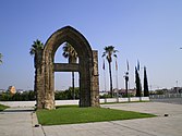 Oreeginal portal o the Carmelite Convent o Barcelona datit frae the 14t hunderyear. Syne 1993, it is situatit in Sant Adrià as if it wis a monument which is locally kent as Arc de Sant Adrià.[13]