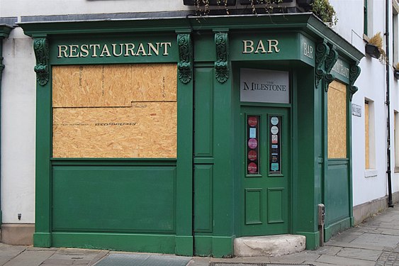 A restaurant boarded up due to COVID-19.