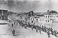 Armenians are marched to a nearby prison in Mezireh by armed Turkish soldiers, 1915.