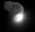 This image shows the initial ejecta that resulted when NASA's Deep Impact probe collided with comet Tempel 1 at 10:52 p.m. Pacific time, July 3 (1:52 a.m. Eastern time, July 4). It was taken by the spacecraft's medium-resolution camera 16 seconds after impact.