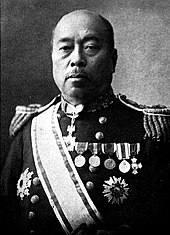 Neck high portrait of middle aged man wearing a military uniform