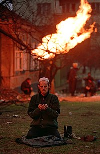 Chechen separatist fighter praying during the First Chechen War