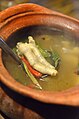 'Tom yam suppoe' is a clear tom yam soup done "super", meaning that it contains chicken feet. Why "super" for chicken feet? No one knows.