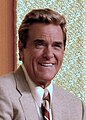 A head shot of Chuck Woolery