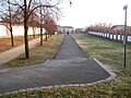 patrol road on Invalidenfriedhof cemetery; marked as part of the Berlin Wall Path („Berliner Mauerweg“)