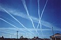 Image 14Water vapor contrails left by high-altitude jet airliners. These may contribute to cirrus cloud formation. (from Aviation)