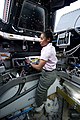 Stephanie Wilson relaxing to music in the Cupola during STS-131, April 2010