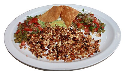 Escamoles al mojo de ajo, nom-om-om! This Mexican dish, consisting of larvae and pupae of Liometopum ants (served with garlic sauce), is likely another of the anteater's favorite snacks.