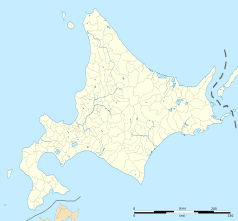 Mapa konturowa Hokkaido, blisko centrum na dole znajduje się punkt z opisem „Mukawa”