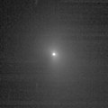 This image shows comet Tempel 1 as seen through the clear filter of the medium-resolution camera on NASA's Deep Impact spacecraft. It was taken on June 29, 2005, when the spacecraft was 4,151,586 kilometers (2,579,795 miles) away from the comet. Four images were combined together, and a logarithmic stretch was applied to enhance the coma of the comet.