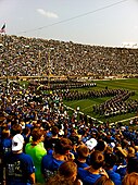 The Band of the Fighting Irish spells out ND through which the Notre Dame Fighting Irish Football Team runs onto the field