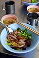 'Bami haeng ped': Wheat noodles with duck (and here also with blood tofu) served "dry" (Thai: haeng) with the broth on the side