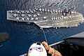 Image 6United States Navy personnel engage in Special Patrol Insertion/Extraction (SPIE) training between a Sikorsky SH-60 Seahawk helicopter and the USS Dwight D. Eisenhower (CVN-69). SPIE involves either a person or goods being lowered from or raised to a helicopter via a cable above terrain on which landing would be difficult.