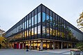 Library building of German National Library of Science and Technology / University Library Hannover (TIB / UB) located at Am Welfengarten no. 1b in Nordstadt district of Hanover, Germany. View of the facade where the main entrance is located (in red)