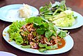 This particular version of 'Lap mu', the Isan minced pork salad, was extremely spicy and contained copious amounts of ground dried chillies, ground roasted sticky rice ('khao khua', giving the dish a nutty taste), culantro and mint