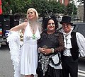 Drag queens Luc D'Arcy and Carbonera and friend at the 2003 Divers-Cité pride parade in