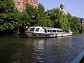 A tour boat passing nearby the Rijksmuseum in Amsterdam