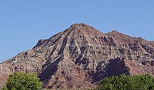 Hill with colorful rock