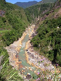 Heavily sulfur-stained Pasil River, upstream from Bu-ot Fumarole Field