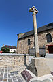 Croix du XVe siècle de l'ancien cimetière qui entourait l'église paroissiale Saint-Malo[180].