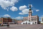 Zamość City Hall, designed by Bernardo Morando, is a unique example of Renaissance architecture in Europe, consistently built in accordance with the Italian theories of an "ideal town".[276]