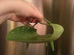 A silicone food steamer to be placed inside a pot of boiling water