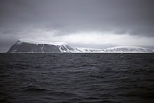 The southernmost point, Kapp Thor, and the highest point, Iversenfjellet (370 m) seen from south