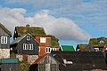 Image 8Traditional Faroese houses with turf roof in Reyni, Tórshavn. Most people build larger houses now and with other types of roofs, but the turf roof is still popular in some places. (from Culture of the Faroe Islands)