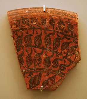 Fragment of a large deep vessel; circa 2500 BCE; red pottery with red and black slip-painted decoration; Brooklyn Museum (New York City)