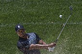 Woods practices on the driving range at the Quicken Loans National golf tournament (24 June 2014)