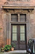 This door in the courtyard of the Hôtel de Massas is actually a window from the last quarter of the 16th century transformed into a door in the 19th century.