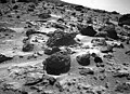 This view of the rock "Chimp" was acquired by the Sojourner rover's left front camera on Sol 74 (September 17). A large crack, oriented from lower left to upper right, is visible in the rock. A dark crust appears to cover Chimp in some areas whereas other parts of the rock have a lighter shading. A boundary between the two regions is clearly seen in the upper left part of Chimp. This image and PIA01579(right eye) make up a stereo pair. Mars Pathfinder is the second in NASA's Discovery program of low-cost spacecraft with highly focused science goals. The Jet Propulsion Laboratory, Pasadena, CA, developed and manages the Mars Pathfinder mission for NASA's Office of Space Science, Washington, D.C. JPL is an operating division of the California Institute of Technology (Caltech).