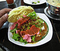 Asinan betawi with krupuk as condiment.