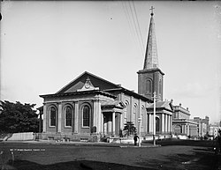 Black and white photo of the church showing the eastern and northern faces.