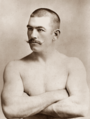 John L. Sullivan in 1882 (Foto: José Maria Mora) overleden op 2 februari 1918